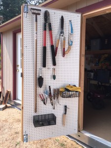 peg board on garden shed door